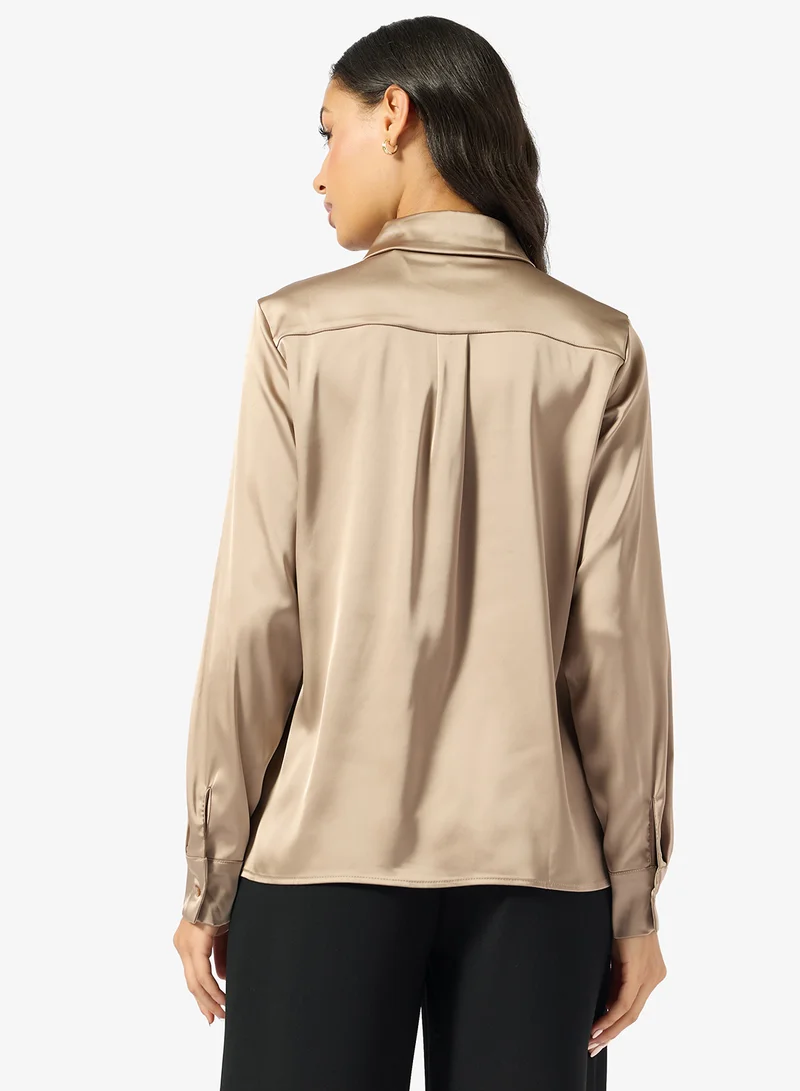 جس قميص بأكمام طويلة مزين بالترتر مارغريت